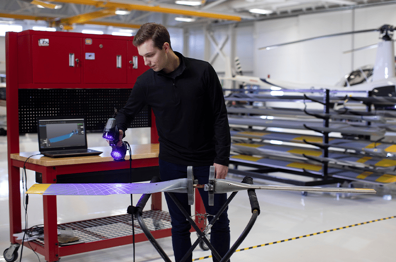 aerospace 3D scanner used by worker